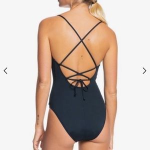NWOT one piece black Roxy bathing suit.